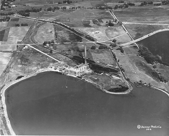 Aerial view of the Public Service Co. Valmont Plant across Hillcrest Reservoir. The photo is believed to be circa 1925-1937. Valmont Power Station closed in January 2019. Source: Boulder Historical Society/Museum of Boulder.