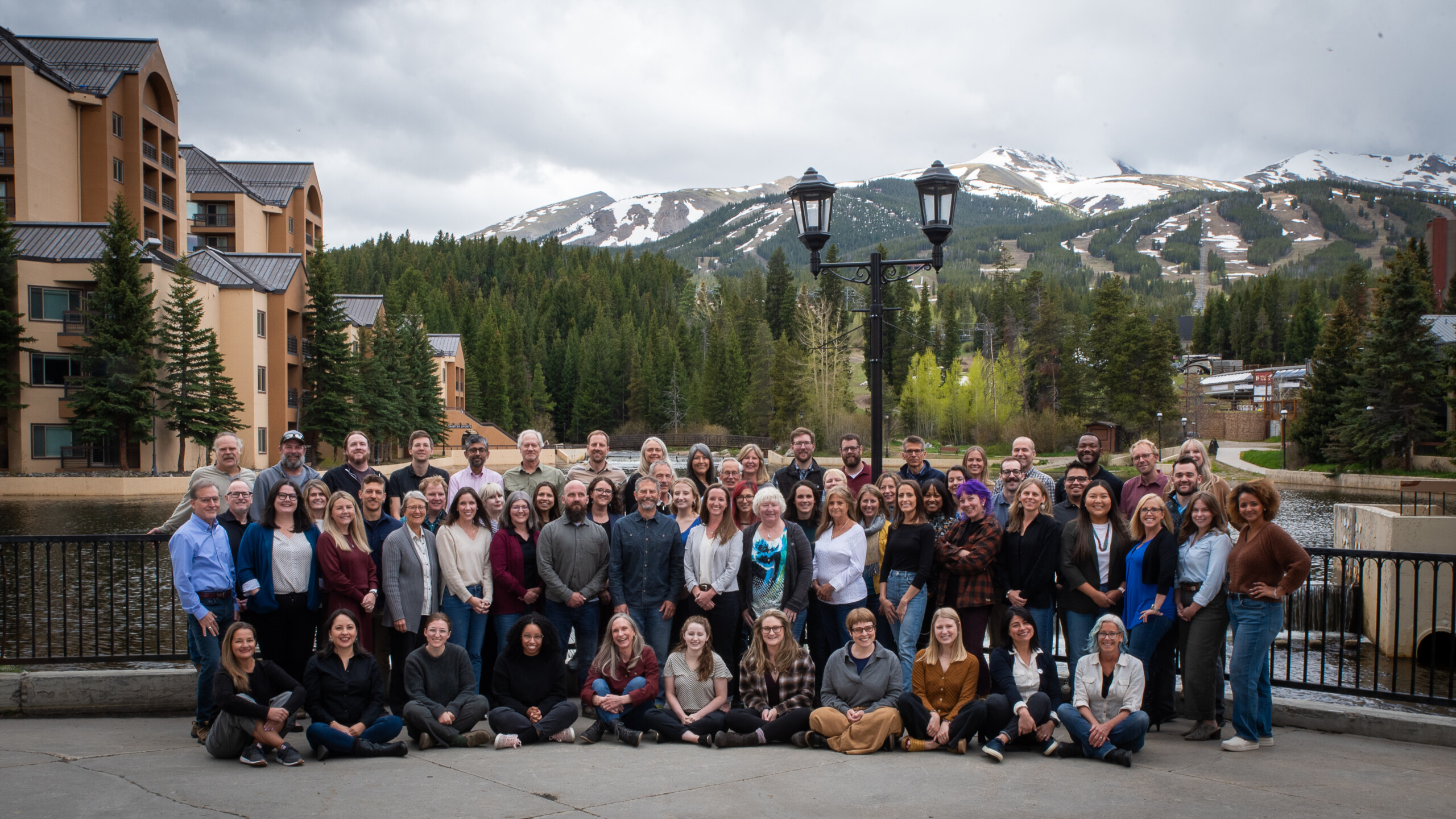 WRA staff members pose in front of mountains at the 2023 Breckenridge Staff Retreat