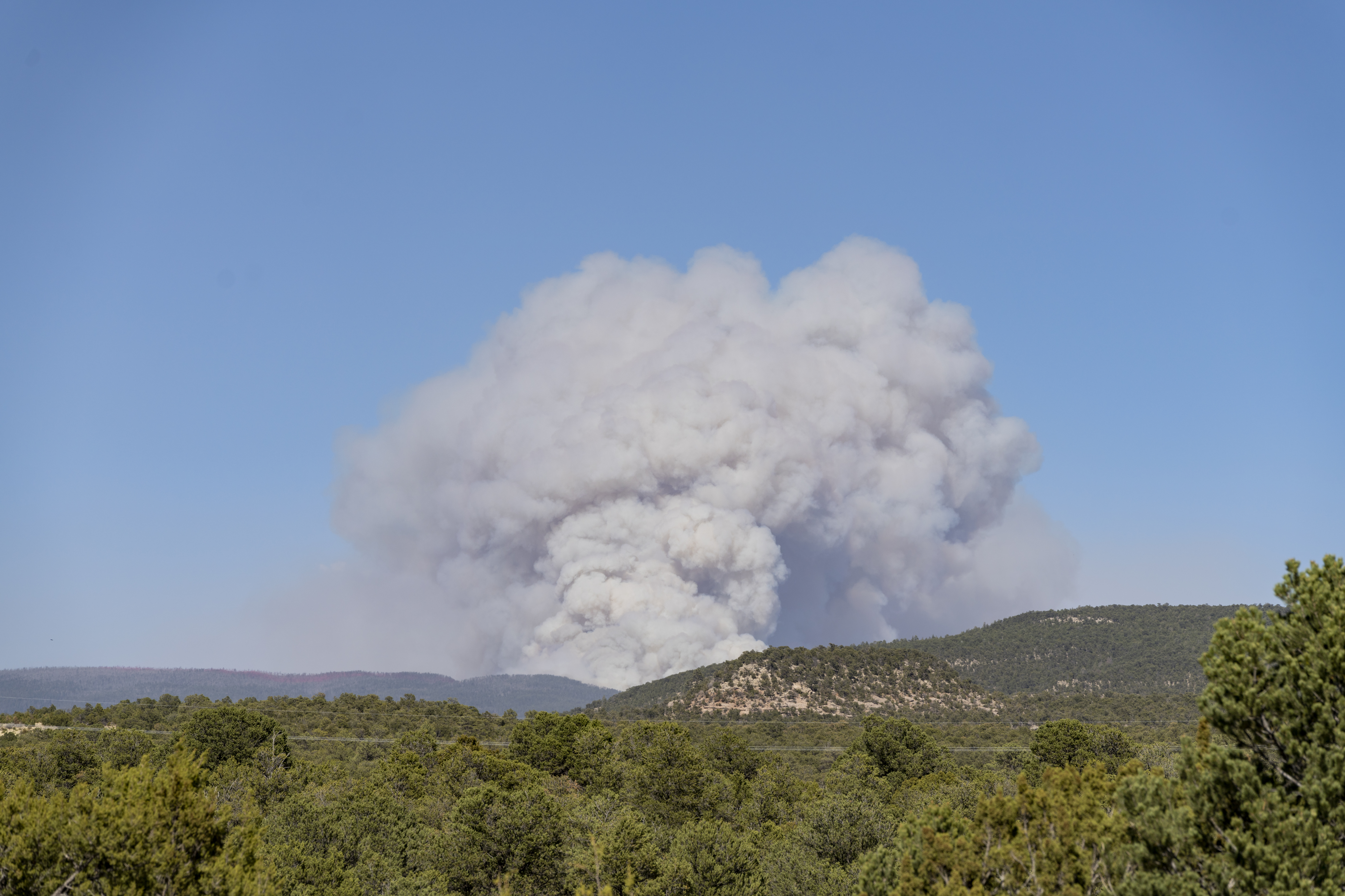 Billowing smoke from Calf Canyon Hermits Peak fire in New Mexico