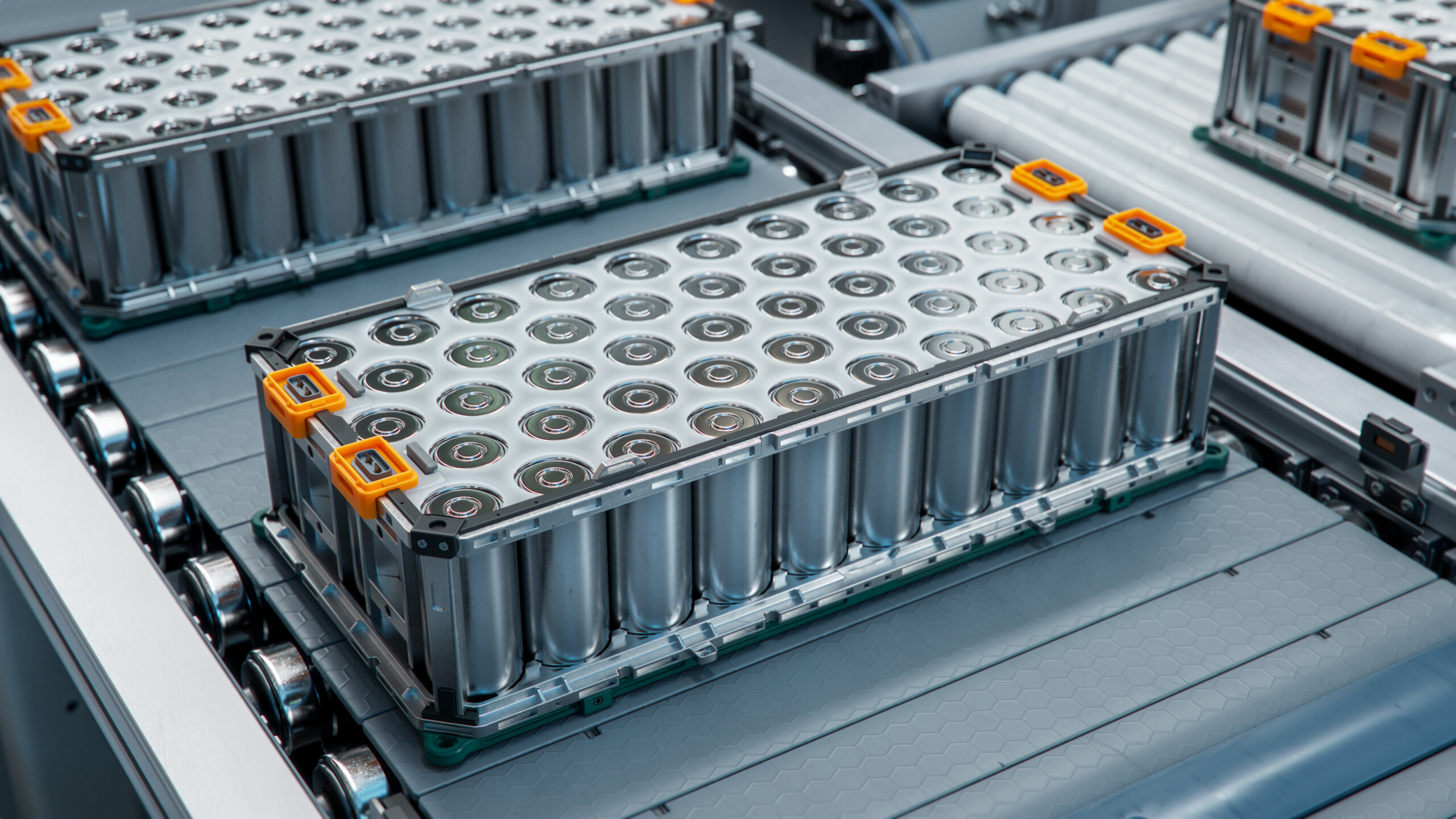 Lithium-ion High-voltage Battery Component for Electric Vehicle or Hybrid Car. Battery Module for Automotive Industry on Production Line. High Capacity Battery on Conveyor. Close-up of a lithium-ion battery pack with orange connectors on a conveyor belt, used in electric vehicles.