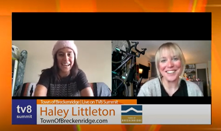 IMG_3839 Two women are speaking in a video call. The screen displays "tv8 summit," "Haley Littleton," and "TownOfBreckenridge.com" with the Town of Breckenridge logo.