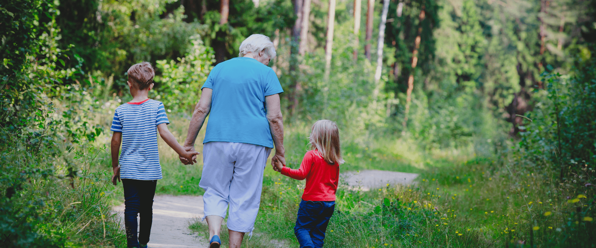 grandma walking with two grandkids outside (1)