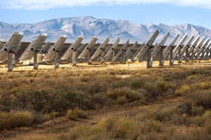 Solar panels array in a desert landscape.