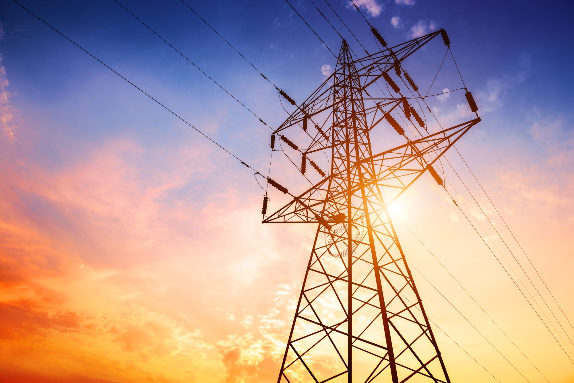 AdobeStock_182646517_transmission_lines_sunset